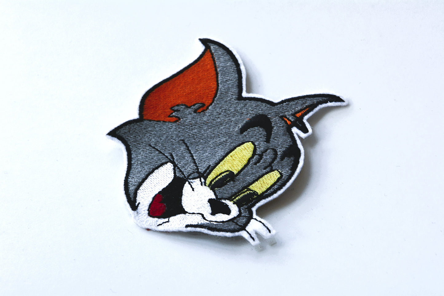 Tom - Iron On Patch